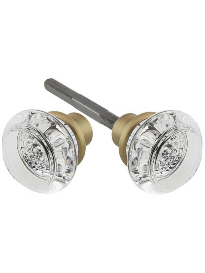 Pair of Lead Free Round Crystal Door Knobs with Brass Base in Antique Brass.